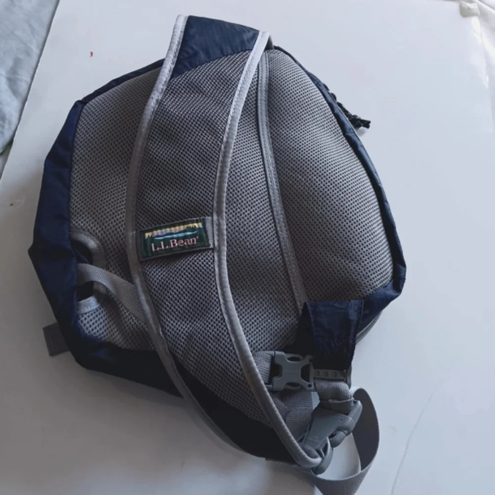 L.L. Bean Navy and Gray Stowaway Sling Backpack